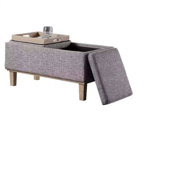 Pouffe de rangement rectangulaire gris capitonné à pieds en bois, 1 place